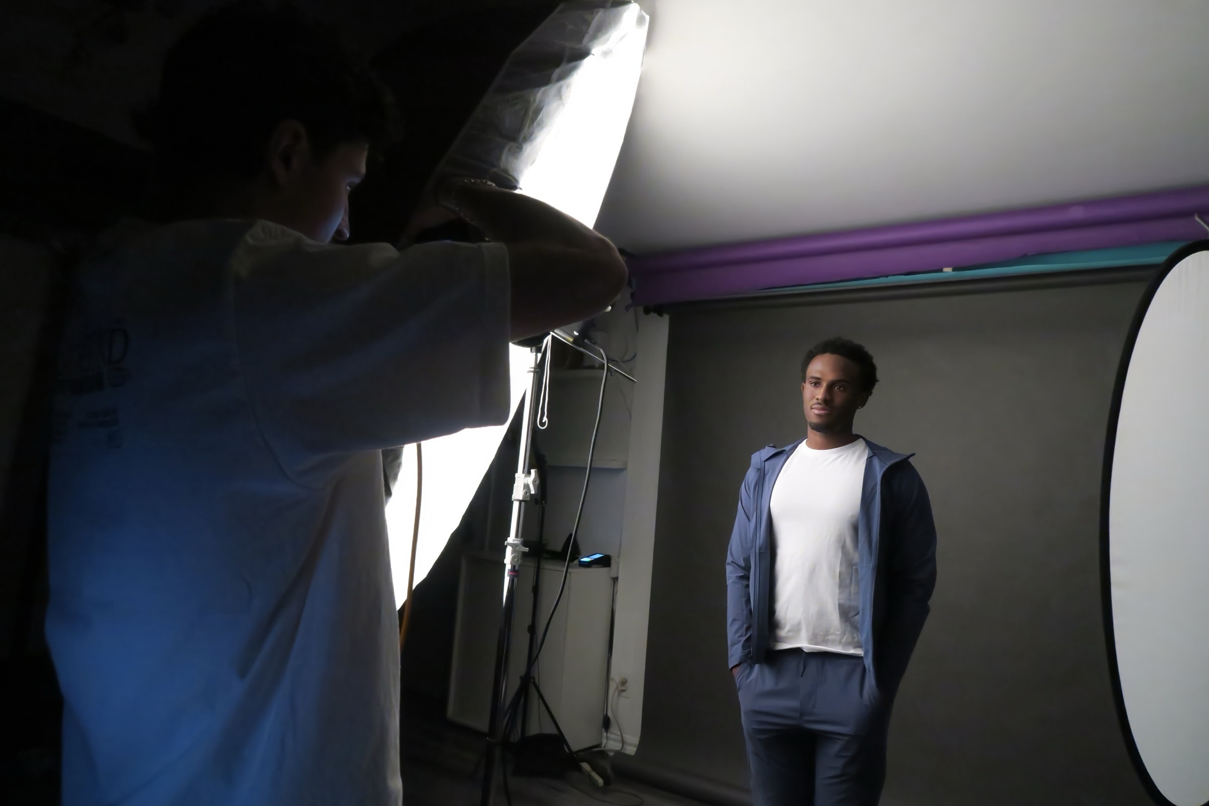 A headshot being directed and lit in the Shiki Studios Toronto studio