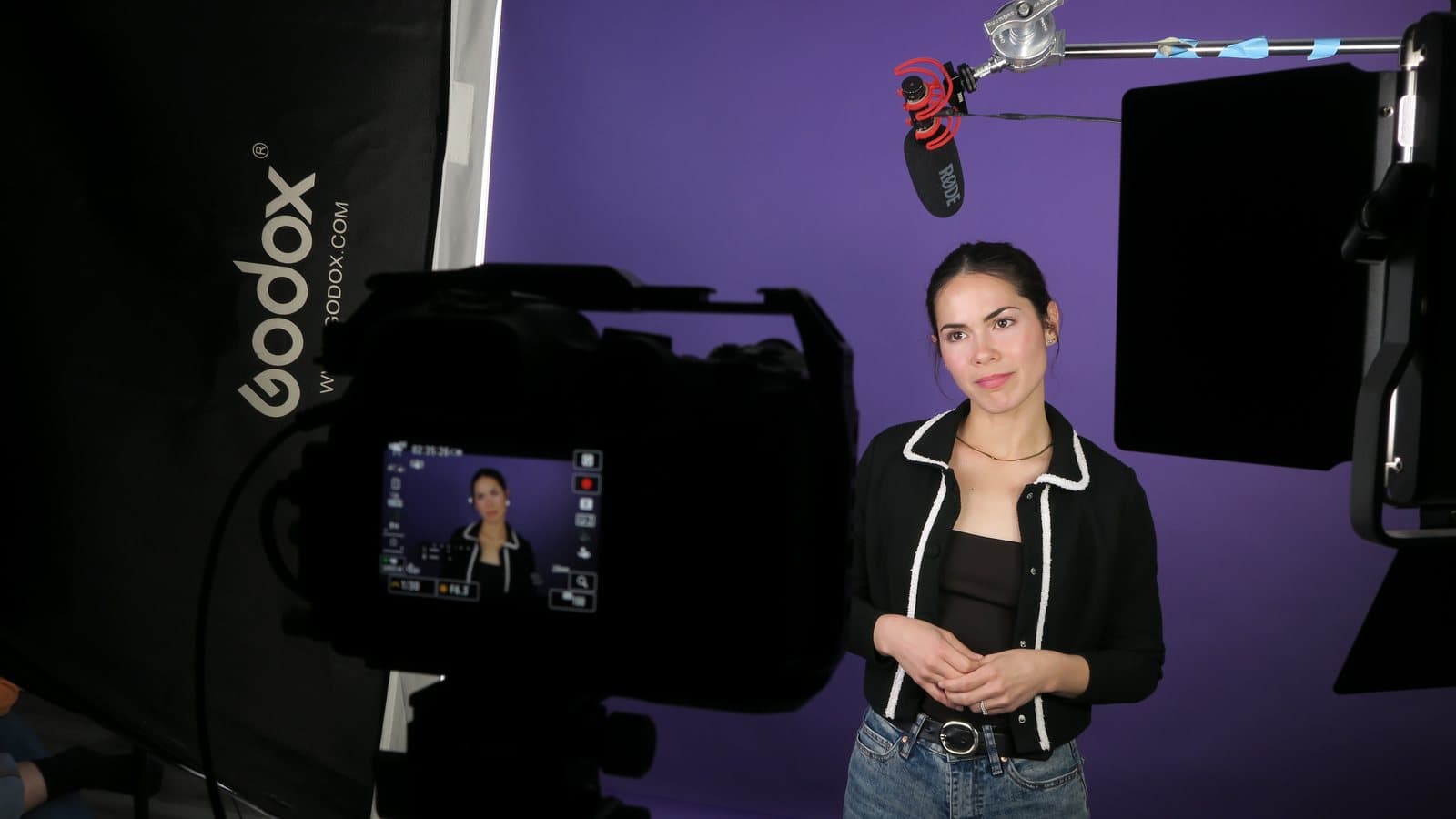 An actor framed on the camera monitor as the take rolls