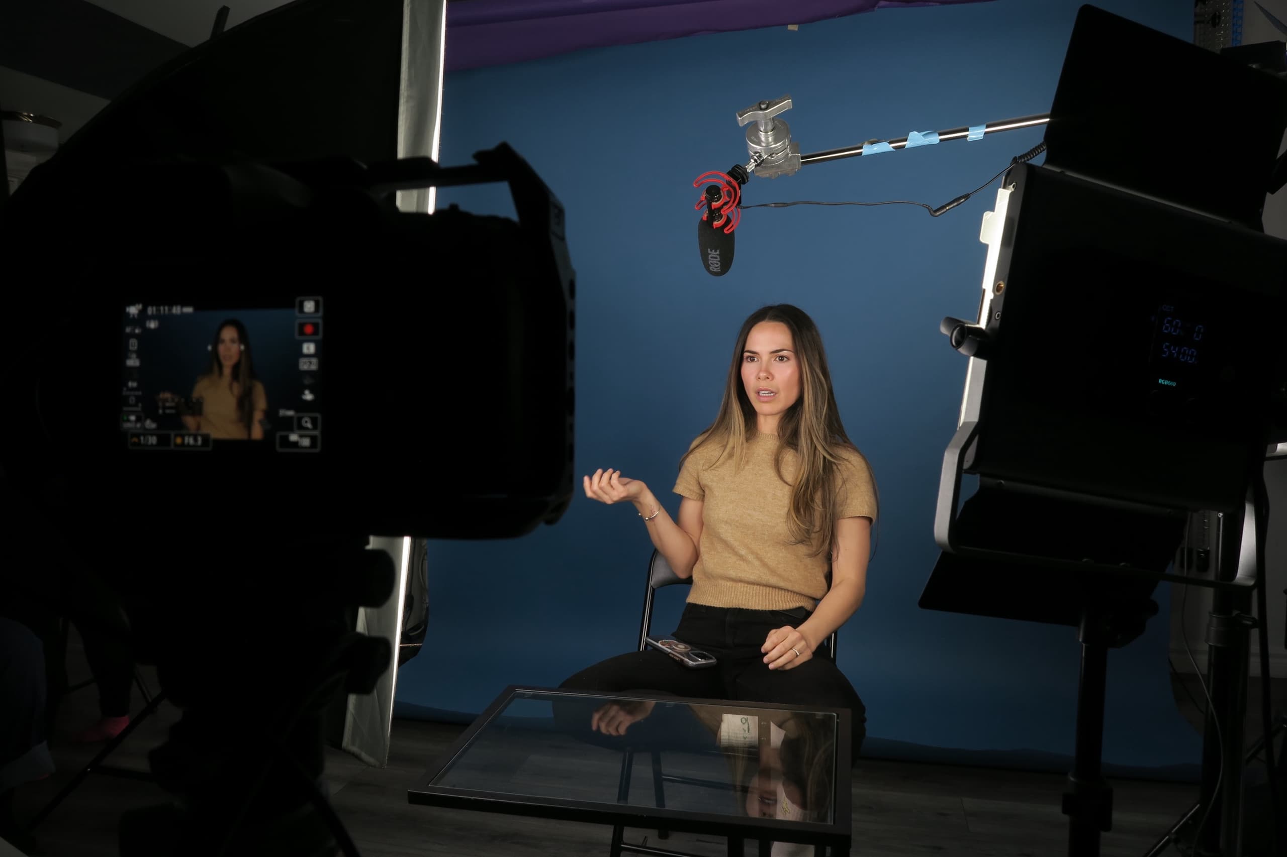 An actor framed on the camera monitor as the take rolls